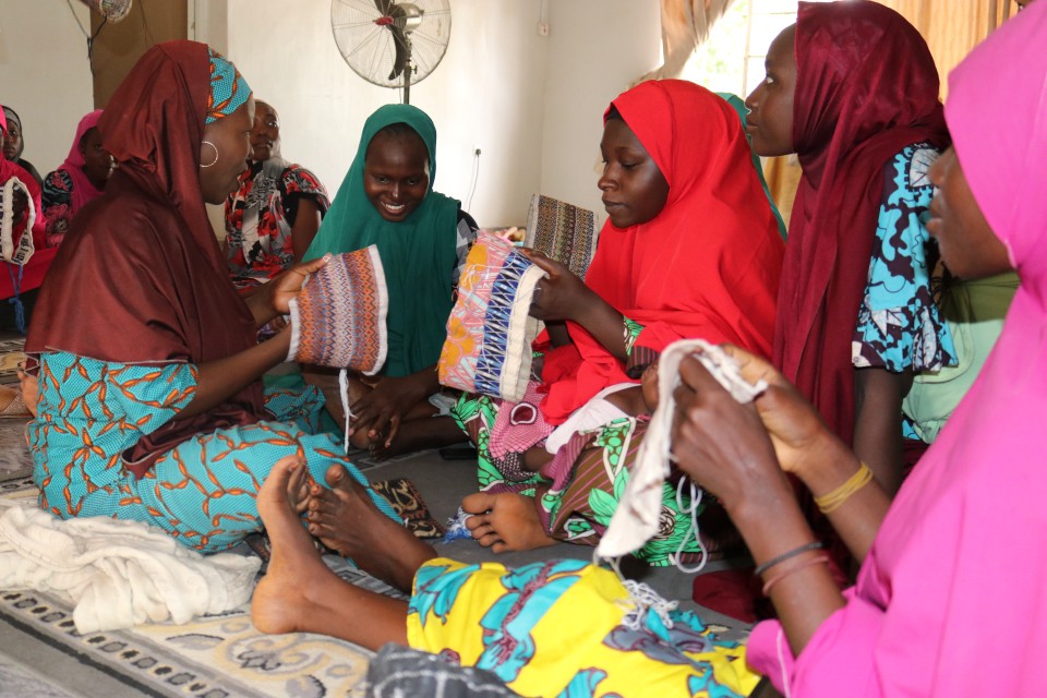 Women knitting caps to be sold at the Empowerment Hub in Maiduguri Photo by Marian Roberts
